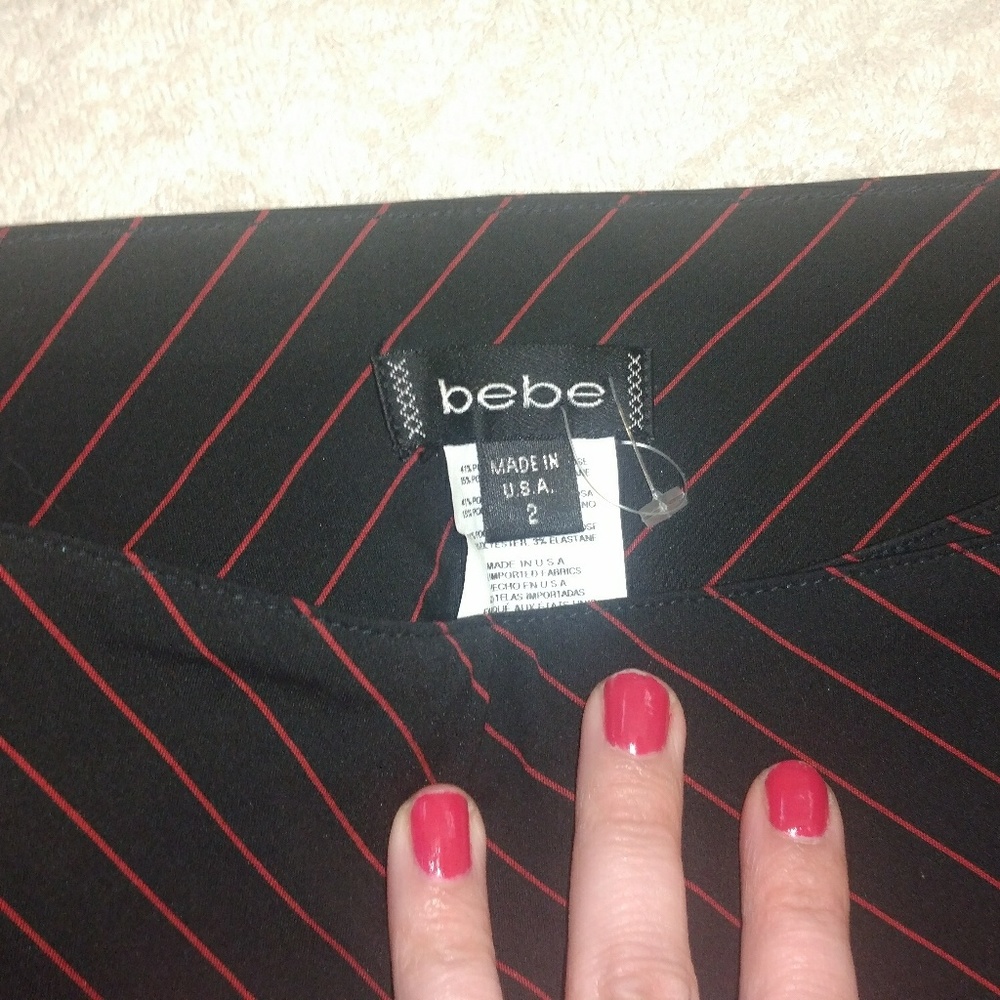 Bebe black & red pinstripe pants.